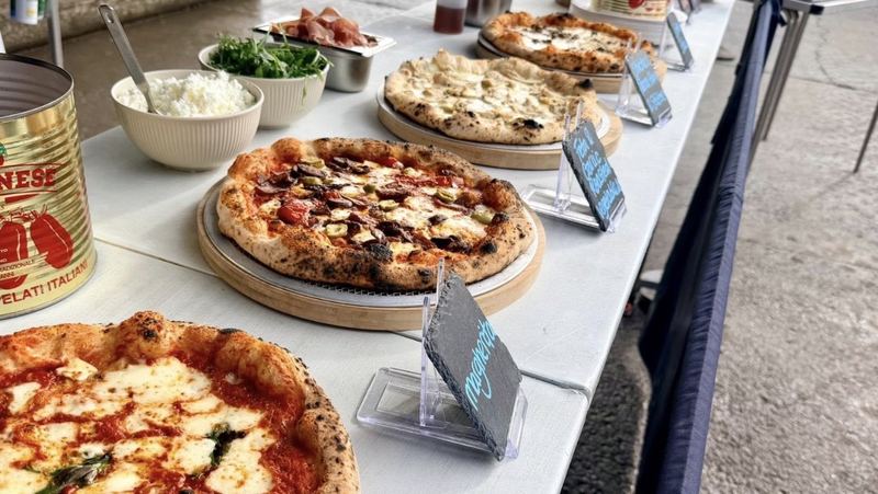 Scottish Pizza Co pizzas laid out on a serving table